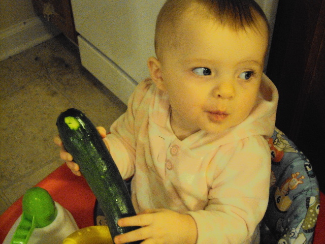 We finally found the best remedy for achy teething gums: partially frozen zucchini. 