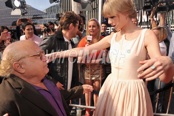 Source http://www.wireimage.com/celebrity-pictures/Actors-Danny-DeVito-and-Taylor-Swift-arrive-at-the-Dr-Seuss-The-Lorax/139360633