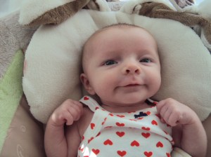 Looking all happy with the world at 2MO. 