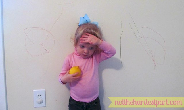 Here is the artist with her work. And a lemon. There's a lemon too.